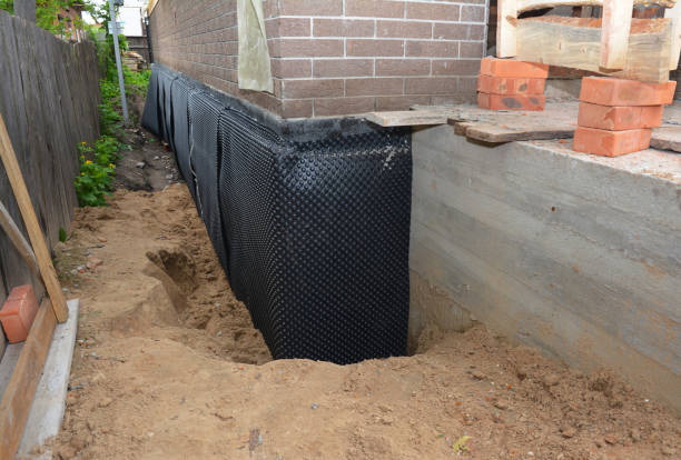 Happy homeowners after waterproofing job in Middleport